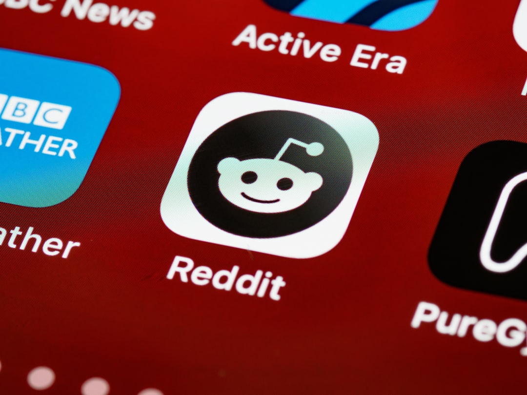A red, white, and black panda logo with a stylized head and ears.